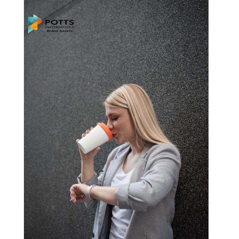 Office worker holding coffee cup representing overwork and self-sacrifice