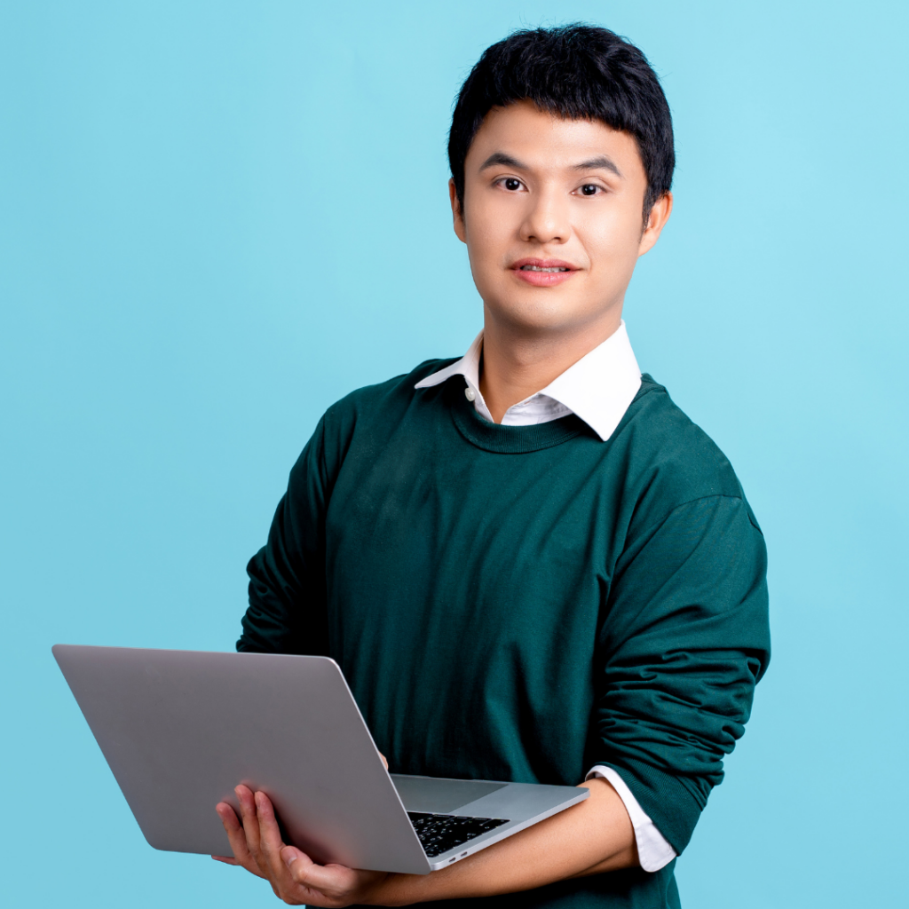 man holding a laptop